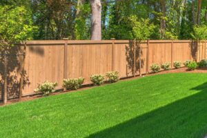 wood-fence-installed-between-the-yard-and-woods-of-the-house-milton-fl